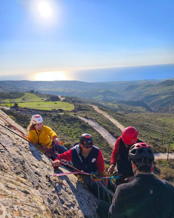 Climbers talking at the anchor on the SMPC at Alykou, Paphos
